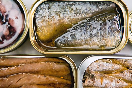 Tins of different sizes and opening