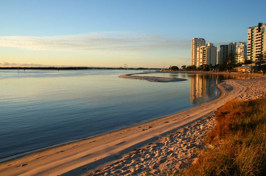 Coastal hamlet and lagoon bathed in the early morning light.