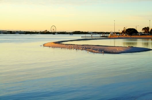 Sunrise over Ian Dipple Lagoon at Labrador Gold Coast Australia.