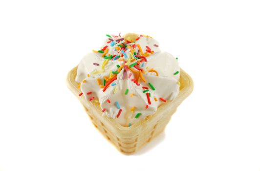 Sweet marshmallow cone with colored cake sprinkles.