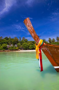 Longtaill boat and turquoise water at tropical beach