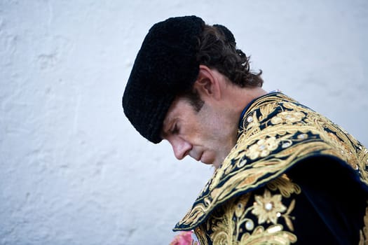 The bullfighter spanish Jose Tomas getting dressed for the paseillo or initial parade, Taken at Linares bullring before a bullfight, Linares, Spain, 29 august 2011