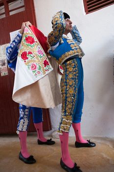 Ivan Fandiño getting dressed for the paseillo or initial parade. Taken at Jaen bullring before a bullfight, Jaen, Spain, 16 october2011