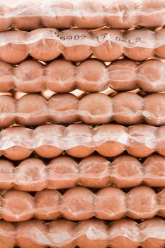 Detail of packages of sausage vacuum-packaged