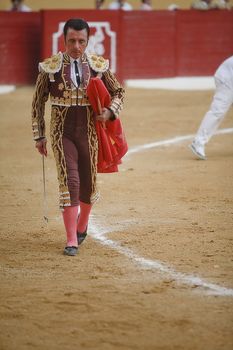 The spanish bullfighter with the Cape in the Bullfight in Atarfe coliseum, Atarfe, Granada province, Spain 25 july 2009