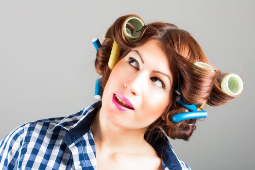 portrait of housewife with curlers