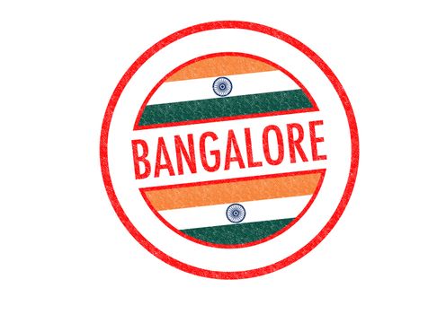 Passport-style BANGALORE (India) rubber stamp over a white background.