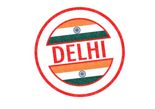 Passport-style DELHI (India) rubber stamp over a white background.