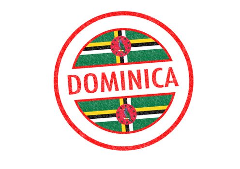 Passport-style DOMINICA rubber stamp over a white background.