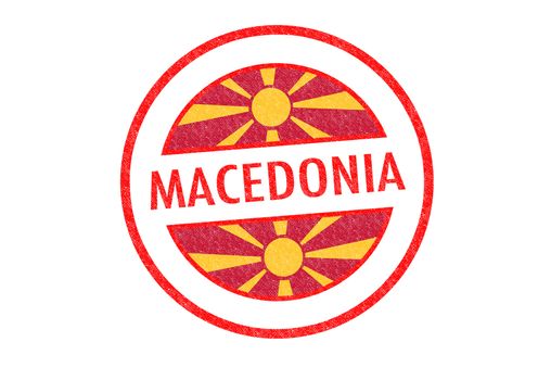 Passport-style MACEDONIA rubber stamp over a white background.