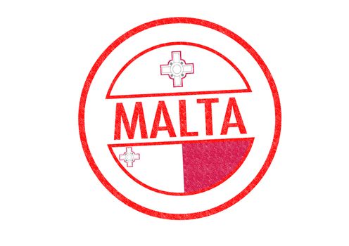 Passport-style MALTA rubber stamp over a white background.