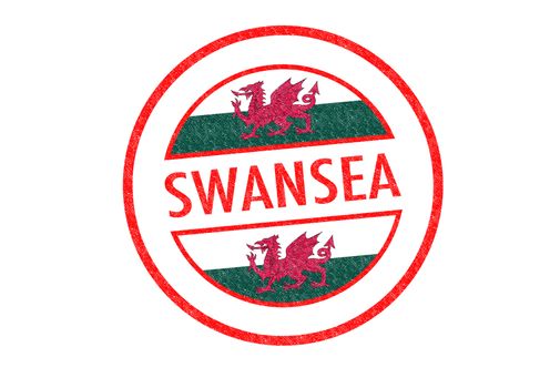 Passport-style SWANSEA (Wales) rubber stamp over a white background.