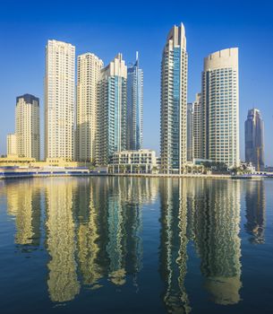 DUBAI, UAE - NOVEMBER 13: High rise buildings and streets nov 13. 2012  in Dubai, UAE. Dubai was the fastest developing city in the world between 2002 and 2008.