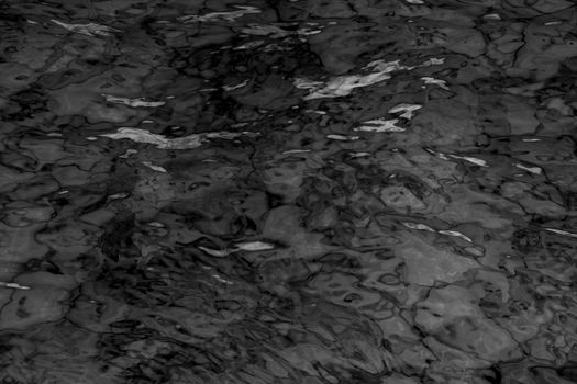 grey abstract background of wavy water surface