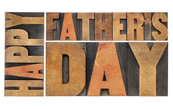 happy father's day - isolated word abstract in antique wood letterpress printing blocks