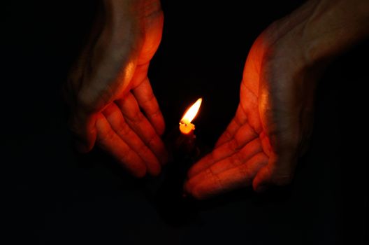 Candle light in hand, Hope concept