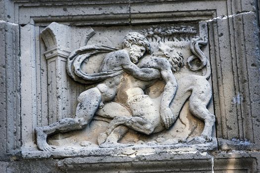 Hercules fighting against the centaur, relief of the Front of the chapel of El Salvador of Ubeda, Jaen province, Spain