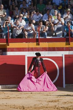 spanish bullfighter with the cape in the bullring, Spain