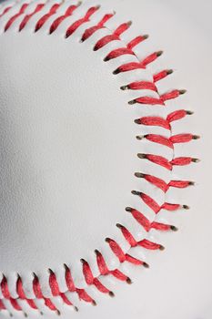 Baseball Ball macro on Stitches suitable as framed background for title text, vertical shot