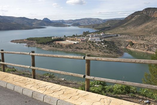 It was inaugurated on June 3, 1969, and belongs to the Guadalquivir hydrographic Confederation. The main tributary of the river Guadalquivir, the Genil, becomes Iznajar in the largest swamp in Andalusia.