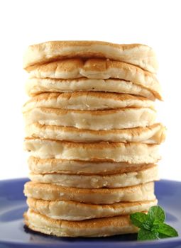 Stack of freshly cooked pancakes ready to serve.