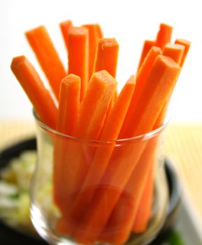 Julienne carrots in a glass ready to serve.