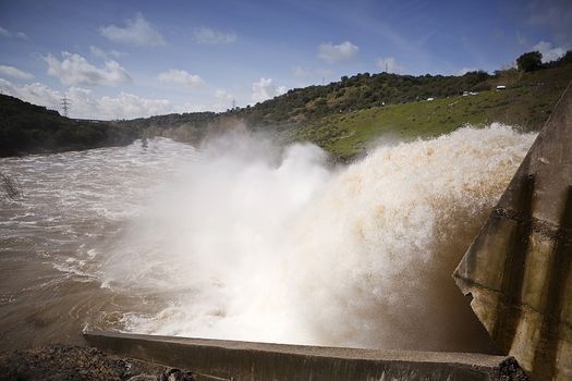 Torrent of water expelled the Guadalmellato River from the reservoir of San Rafael de Navallana, near Cordoba, Andalusia, Spain