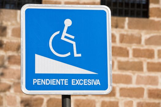 sign of notice for handicapped persons, excessive slope, Spain