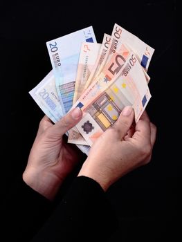 dirty hands grabbing Euro banknotes