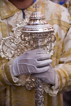 Dalmatic or white robe in a liturgical act of Holy Week, sceptre of silver, Spain