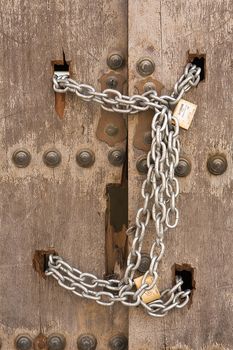 Door closed with chains, Osuna, Sevilla province, Spain