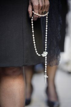 Woman dressed in mantilla during a procession of holy week, Spain