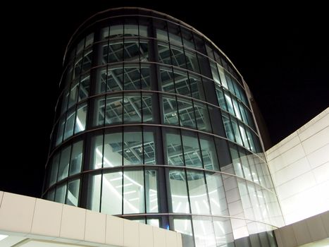 shot of glass see through building taken at night