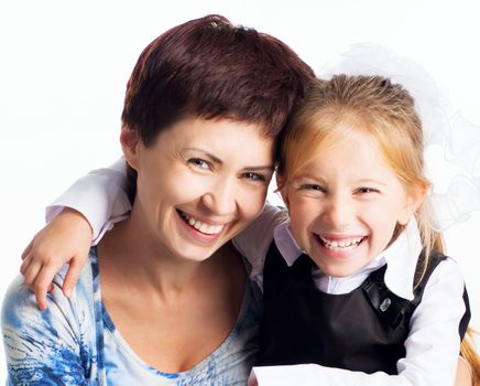 mother and smiling daughter isolated on white background