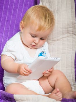 adorable baby with tablet PC