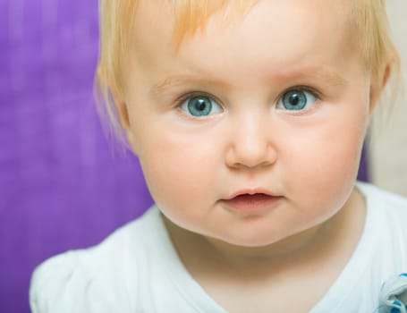 bright closeup portrait of pretty baby