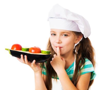 little girl in chef hat with sandwich from vegetables on a white background