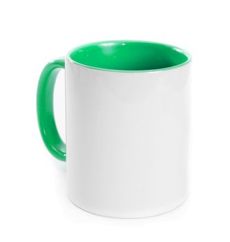 white cup with a green handle and the inner surface isolated