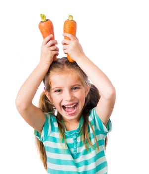 little girl with two carrots isolated on white background