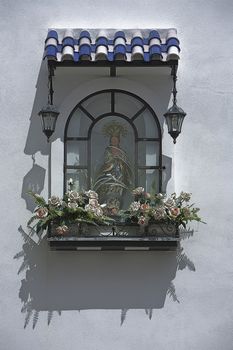 Small altarpiece of a virgin in the street, typical of the street in Osuna, Sevilla province, Andalusia, Spain