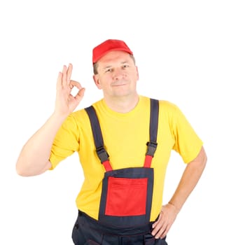 Worker shows hand sign okey. Isolated on a white backgropund.