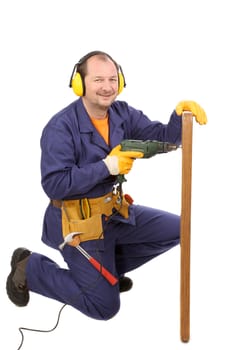 Worker in ear muffs with drill and board. Isolated on a white backgropund.