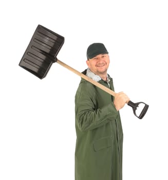 Man in long vest with shovel. Isolated on a white background.