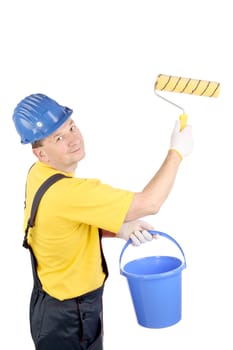 Worker in hardhat paints. Isolated on a white background.