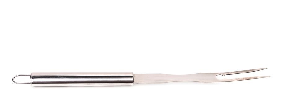 Metallic barbeque fork. Isolated on a white background