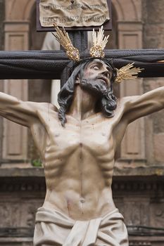 Figure of Jesus on the cross carved in wood by the sculptor Gabino Amaya Guerrero, Holy Christ of the expiry, Linares, Jaen province, Spain