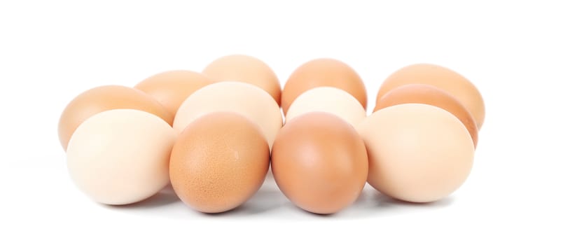 Brown and white eggs. Isolated on a white background.