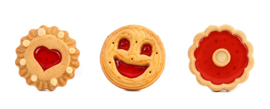 Thre different cookies with jam in row. Isolated on a white background.