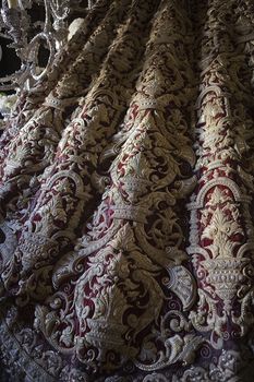 Detail the Virgin's mantle embroidered on red velvet, Seville, Andalusia, Spain