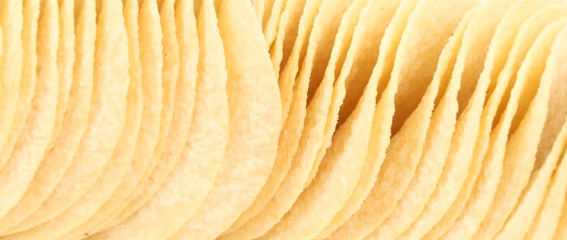 Close up of potato chips. Whole background.